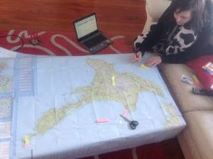 Hannah planning our North Island driving route